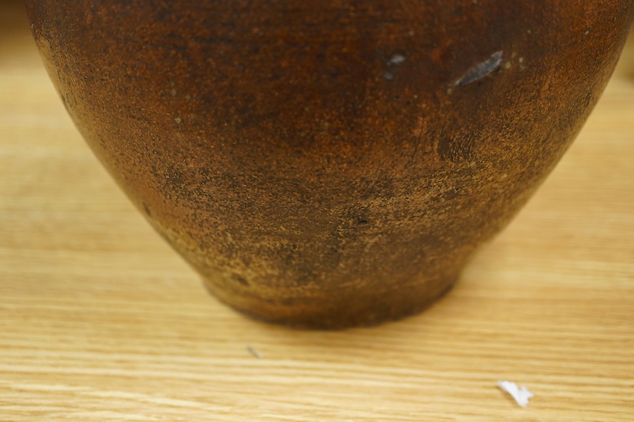 A Bellarmine stoneware jug, 17th century, 36cm high